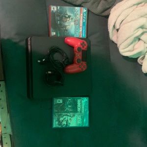 Selling ps4 and a controller with some games